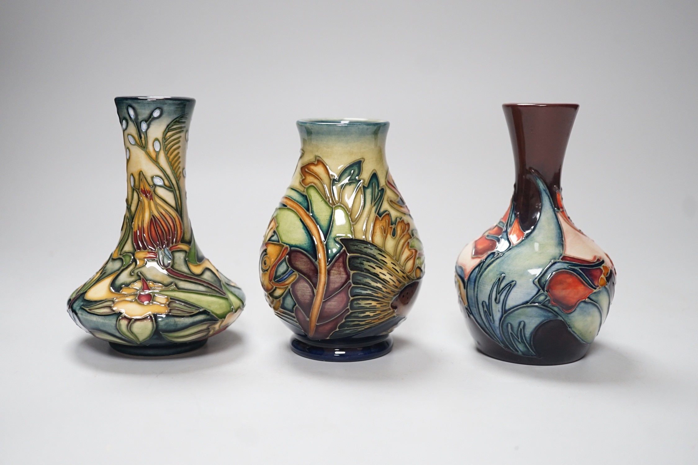 Three boxed Moorcroft vases, tallest 10. 5 cm, Trout, etc.